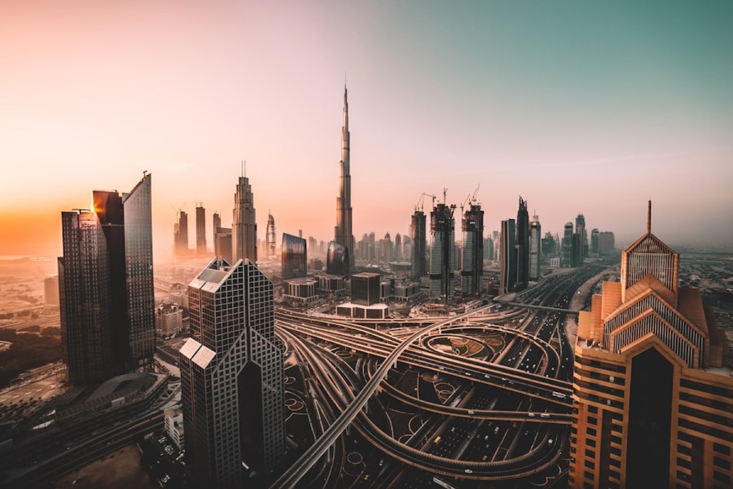 Dubai skyline at sunrise with the Burj Khalifa